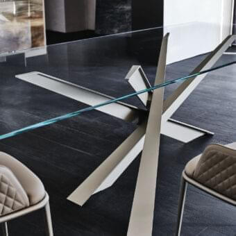 Architectural Cattelan Italia Lancer table with embossed lacquered steel base and transparent rectangular glass top
