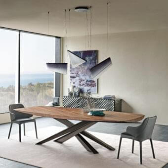 Architectural Cattelan Italia Lancer Wood table with boat-shaped top in warm brown wood and dark lacquered steel base