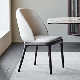 Sophisticated Cattelan Italia Mariel chair with wraparound light gray synthetic leather and dark brown stained wooden legs