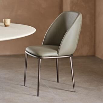 Sophisticated Cattelan Italia Mariel ML chair with matte grey-green upholstery and satin bronze metal base