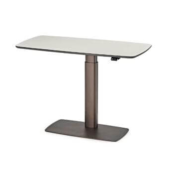 Light neutral rectangular surface sits on a dark bronze cylindrical support with a flattened base