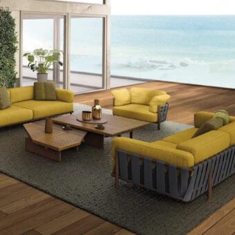 Distinguished Arketipo Punta Ala sofa with vibrant yellow cushions, olive green pillows and woven zigzag backrest crafted in Italy