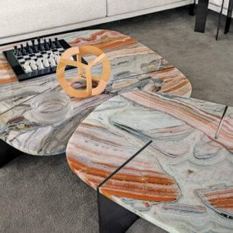 Captivating Arketipo Rumors coffee table with polished variegated marble surfaces and a dark geometric metal base