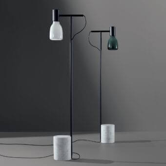 Captivating Bonaldo Acquerelli floor lamp with lead metal structure and hand-crafted dark green blown glass lampshade built with a cylindrical marble base
