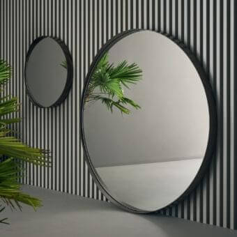 Exclusive Bonaldo Adone mirror, a floor-standing design with a slim dark metal frame and matte finish