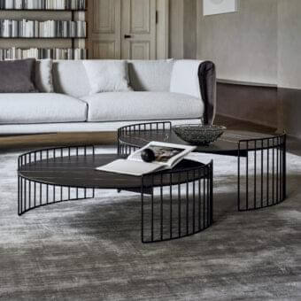 Superior Bonaldo Harpe coffee table with matte black metal base and dark stone-like tabletop exhibiting subtle light veining