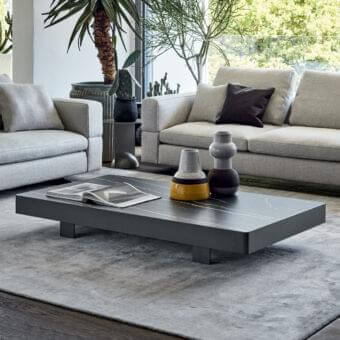 Sophisticated Bonaldo Jazz coffee table with dark marbled top and refined metal edge in matte finish