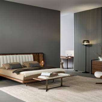 Elegant Bonaldo Nelson bench in veneered Canaletto Walnut wood with a dark metal base and light textile cushion