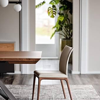 Exceptional Cattelan Italia Arcadia chair with light beige fabric upholstery and natural beech frame with matte finish