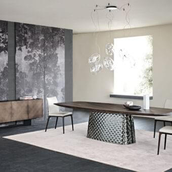 Elegant Cattelan Italia Atrium Wood table with quilted curved glass base and barrel-shaped Canaletto walnut top in dark brown finish