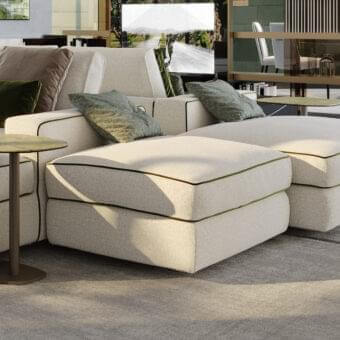 Distinguished Reflex Adone ottoman with light beige textured fabric and refined olive green trim