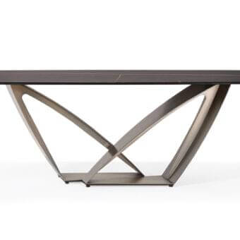 Sophisticated Reflex Apeiron table with curved iron base in muted bronze and dark brown marbled glass top with matte finish