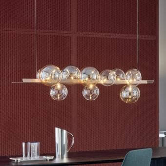 Distinguished Bonaldo Bon Ton suspension lamp with eleven glass lampshades—four amber and seven transparent—mounted on a metal bar