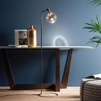Refined Bonaldo Sofi floor lamp with warm amber borosilicate glass and burnished brass cylinder built with a wood joint