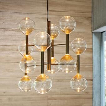 Superior Bonaldo Sofi suspension lamp with thirteen warm amber borosilicate glass globes and burnished brass cylinders