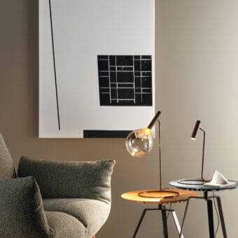 Distinguished Bonaldo Sofi table lamp with warm amber borosilicate glass and burnished brass cylinder construction