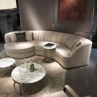 Refined DV Home Collection Charlotte Island sofa with light beige textile upholstery and hexagonal quilted sides