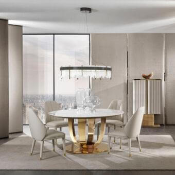 Distinguished DV Home Collection Hermes table with glossy white marble-like tabletop and shiny gold plated stainless steel base