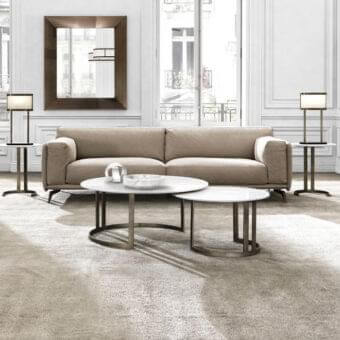 Refined DV Home Collection Hollywood coffee table with stainless steel base and white lacquered round tabletop in bronze matte finish