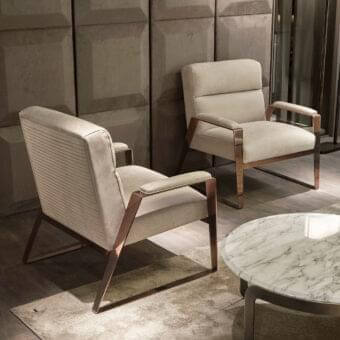 Distinguished DV Home Collection Hollywood lounge chair with quilted backrest and satin metal frame crafted in Italy