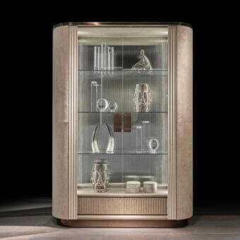 Exceptional DV Home Collection Hollywood showcase with supple leather, ribbed textile and reeded glass doors, accented by steel edges