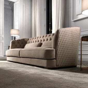 Distinguished DV Home Collection Vogue sofa with warm beige plush textile and matte finish, showcasing deep button tufting and diamond quilting