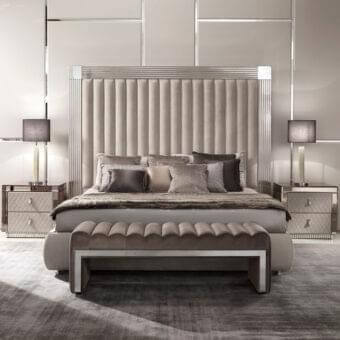Elegant DV Home Collection Windsor bed crafted in Italy with light beige textile upholstery and polished metal framing