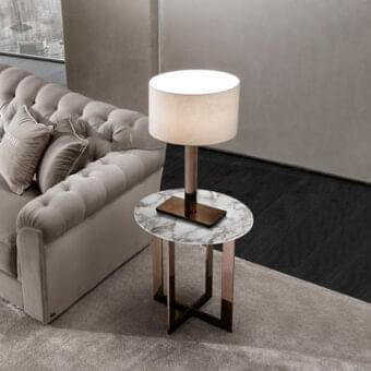 Distinguished DV Home Collection Windsor table lamp with a light beige fabric lampshade and bronze-toned metallic base