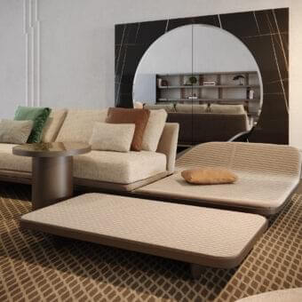 Superior Reflex Segno ottoman with light beige woven textile and exclusive Segno quilting with brown finished metal legs