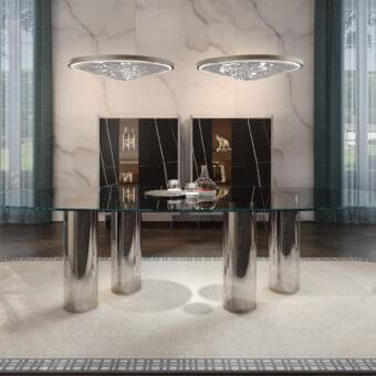 Distinguished Reflex Signore degli Anelli table with extra-clear glass top and Murano glass cylinders supporting a glossy finish