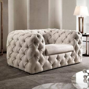 Elegant DV Home Collection Chelsea lounge chair with light beige tufted textile and solid wood structure