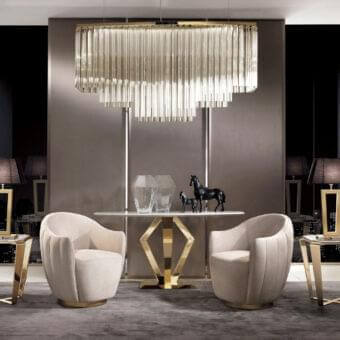 Elegant DV Home Collection Hermes lounge chair with light beige fabric and a stylish round metal swivel base