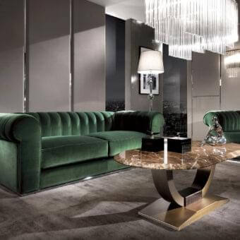 Distinguished DV Home Collection Hermes Plaza coffee table with a brown marbled top and crescent-shaped stainless steel base in a glossy finish