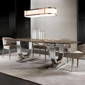 Superior DV Home Collection Hermes table with stainless steel base and dark glass top exhibiting a subtle pattern and polished finish