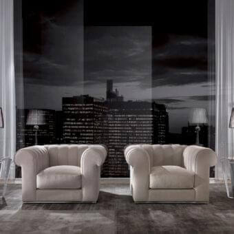 Sophisticated DV Home Collection lounge chair with light beige textile and smooth matte finish built upon a chrome metal base