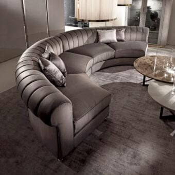 Lavish DV Home Collection Kent sofa with deep gray-brown textile upholstery and sleek chrome metal base