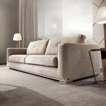 Sophisticated DV Home Collection Master sofa with smooth matte beige textile and refined hexagon quilted finish