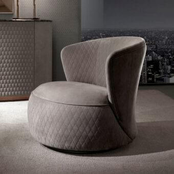 Distinguished DV Home Collection Soho lounge chair with muted gray-taupe textile and refined diamond quilting crafted in solid wood