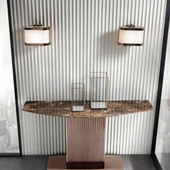 Refined DV Home Collection Windsor console with a marble-patterned top and matte bronze finished stainless steel pedestal base