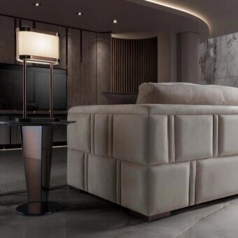 Elegant DV Home Collection Stanley side table with sleek stainless steel column and circular marble top in black finish