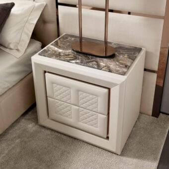 Sophisticated DV Home Collection Adler nightstand crafted in leather with marble tabletop and rose-gold trim exhibiting matt lacquered interiors