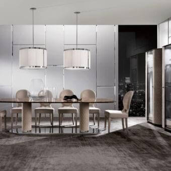 Distinguished DV Home Collection Adler table with oval marble top and quilted beige leather columns, built with a glossy stainless steel base