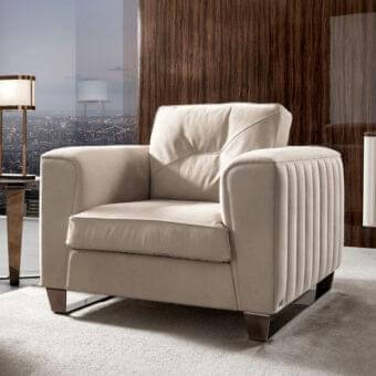 Sophisticated DV Home Collection Beverly lounge chair with light beige textile upholstery and sleek metal base