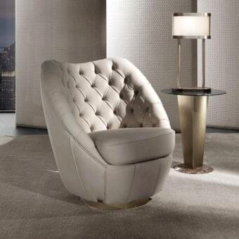 Exclusive DV Home Collection Royal Capitonne' lounge chair with light beige textile upholstery and round swivel steel base