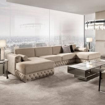 Lavish DV Home Collection sectional crafted in Italy with Italian velvet, button-tufting and metallic trim with a matte finish