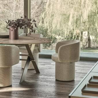 Exclusive Ditre Italia Billie armchair with light beige textile upholstery and rounded sculptural form