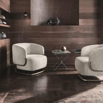 Superior Ditre Italia Marabù lounge chair with neutral beige upholstery and curved metal frame in bronze or gold finish
