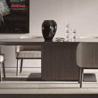 Distinguished Ditre Italia St. Tropez armchair with curved silhouette and light beige textile, built with matte wood frame and legs