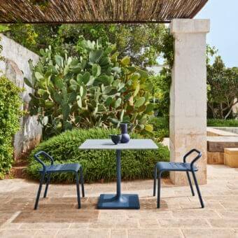 Refined Varaschin Noss chair with aluminum tube structure and dark blue matte powder-coated aluminum seat