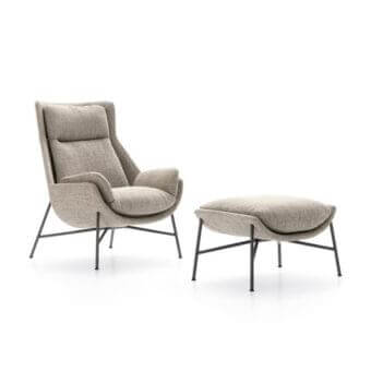 Distinctive Ditre Italia Beetle lounge chair with footrest in textured light beige fabric and slender matte dark metal legs